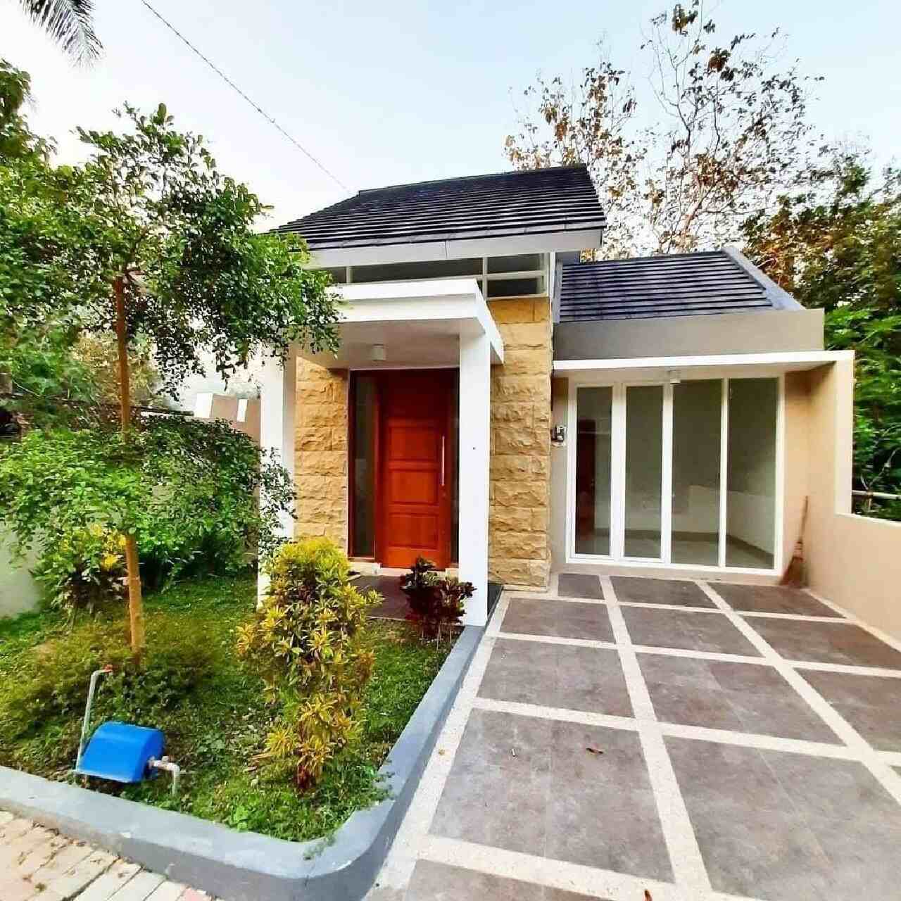 rumah dengan batu alam tampak depan