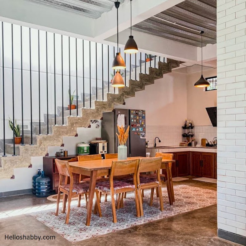 dining room and kitchen next to the stairs