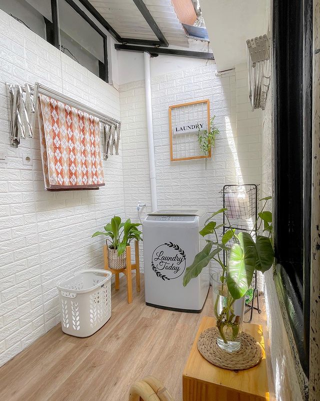 Laundry room with unique wooden elements