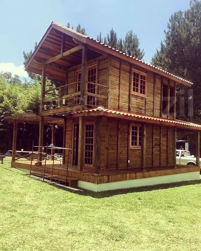 Small minimalist wooden house with 2 floors