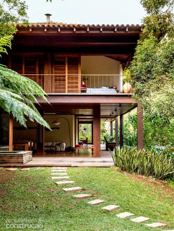 Traditional minimalist 2-story wooden house
