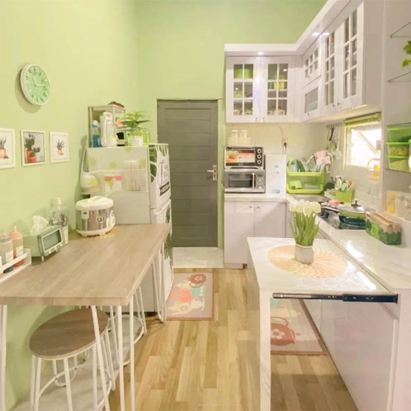 beautiful simple kitchen with yellow wall paint