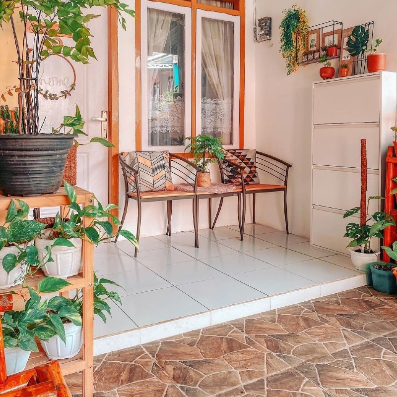 The terrace is seen in front of a minimalist house